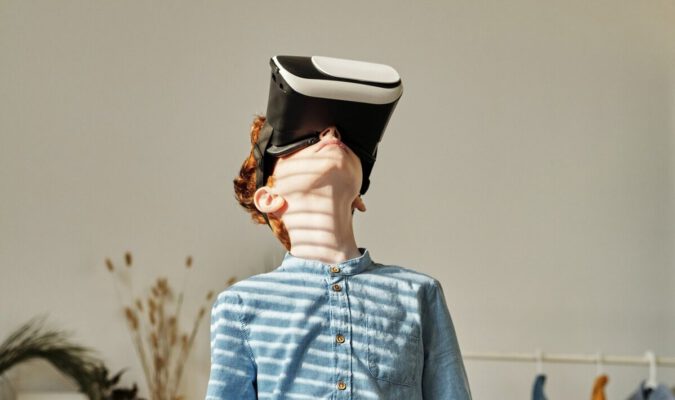 ginger kid wearing a Virtual reality device
